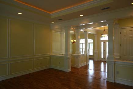 Traditional House Plans, custom home living room design, picture molding trim, wood flooring